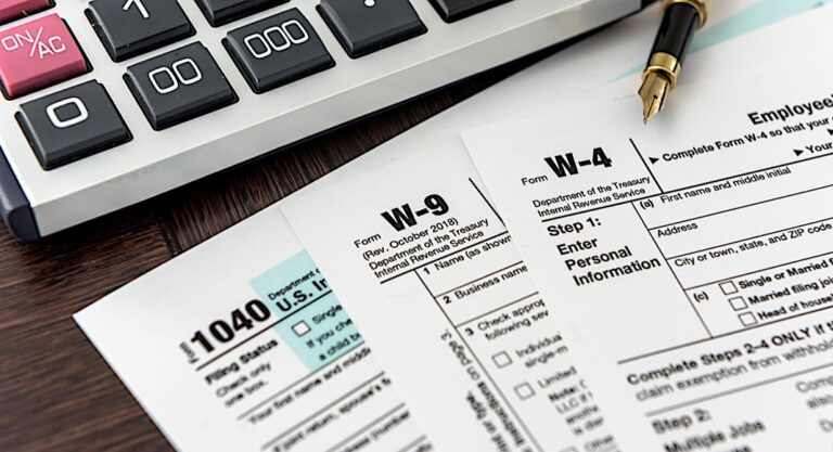 Tax,Forms,With,Calculator,And,Pen.,Financial,Accounting.,Paperwork Tax,Forms,With,Calculator,And,Pen.,Financial,Accounting.,Paperwork
